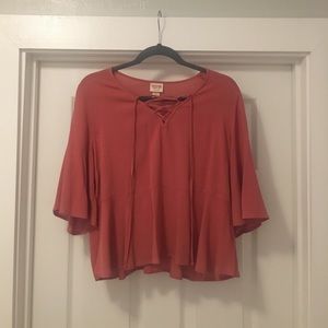 Criss Cross Peplum Top